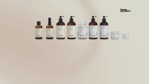 Alma Mom & Baby by Less is More: nine products lined up in front of a soft cream background
